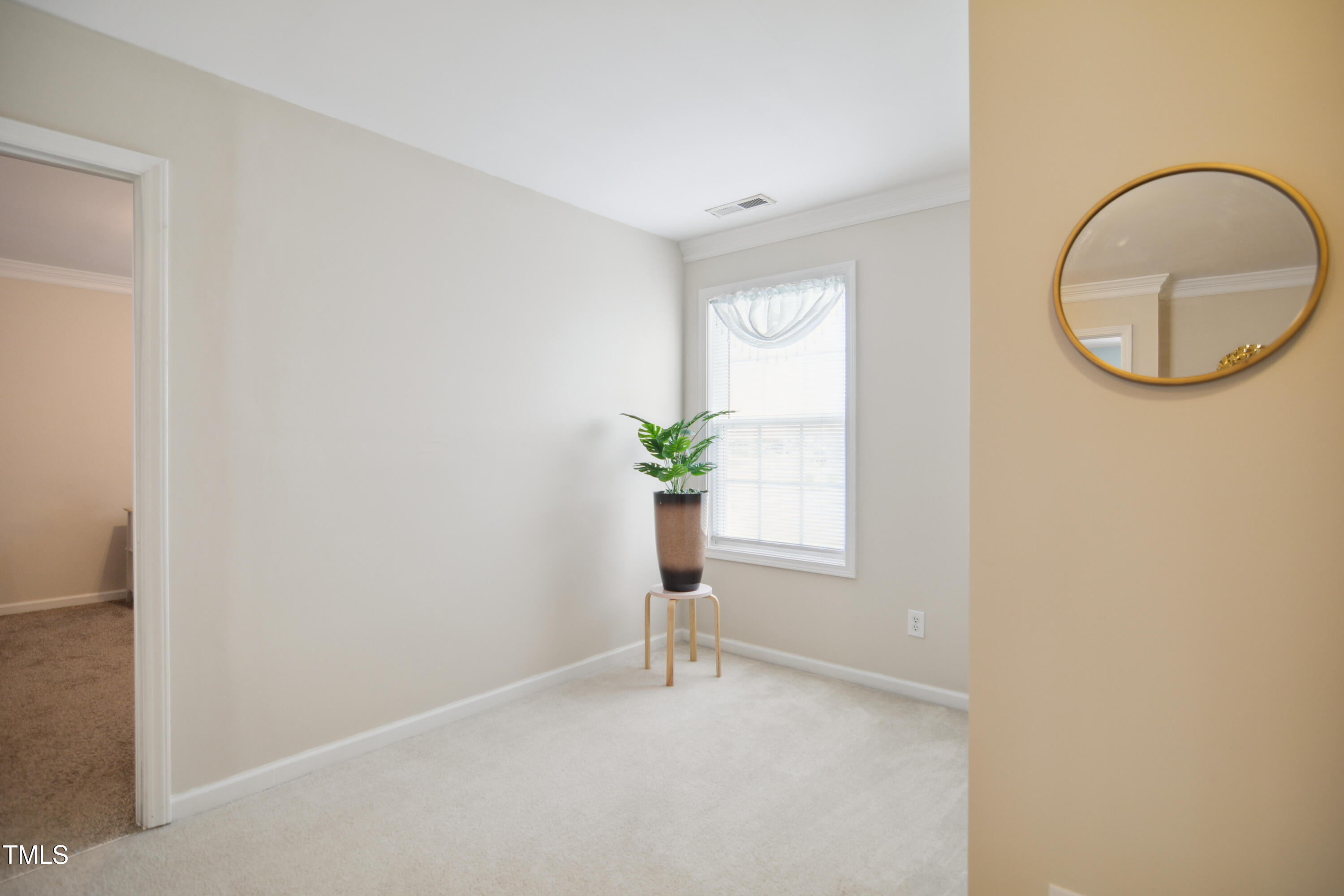 101 Whitney Lane Durham, NC 27713 - Photo 18 of 28 a view of an empty room with a window
