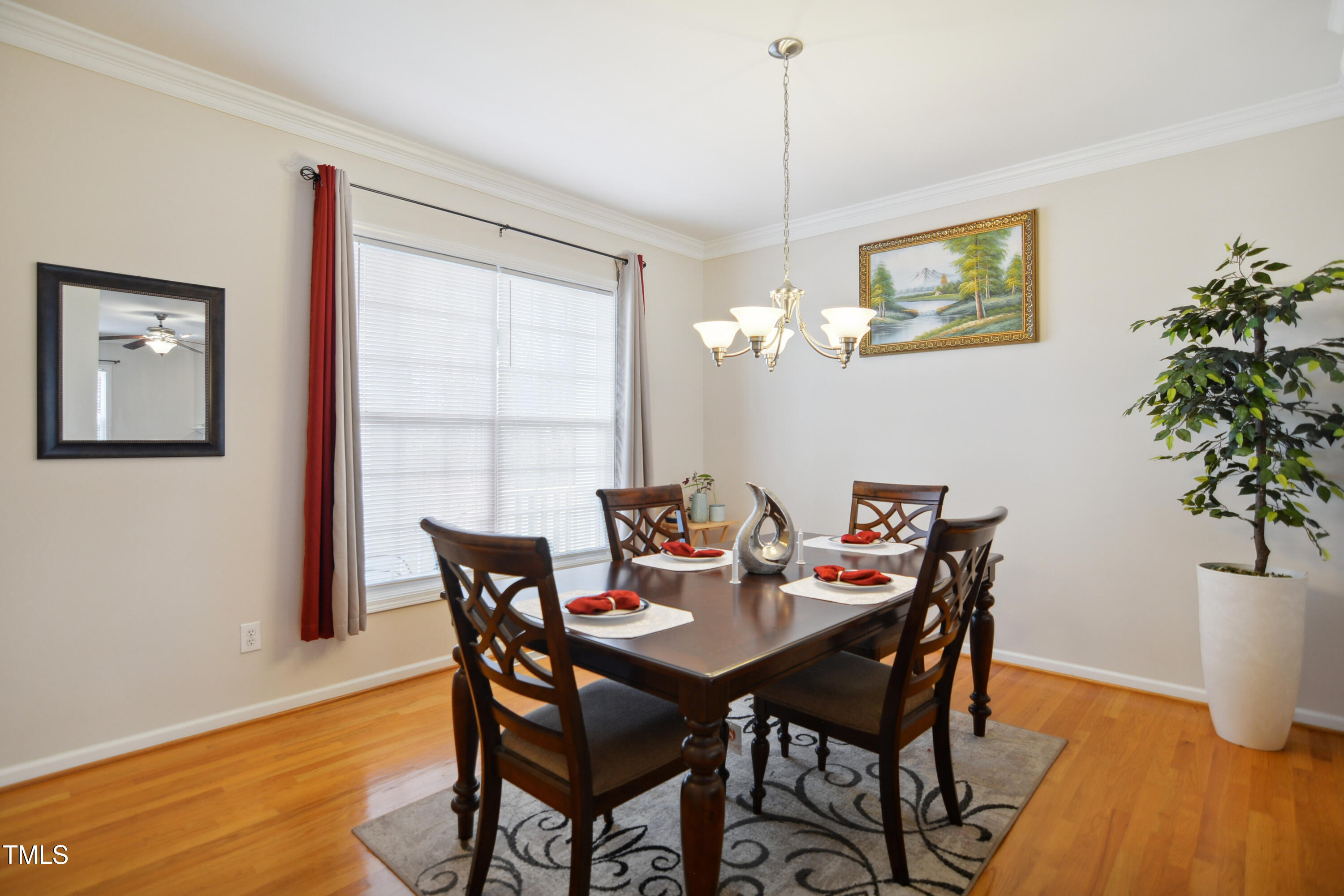 101 Whitney Lane Durham, NC 27713 - Photo 4 of 28 a view of a dining room with furniture window and wooden floor