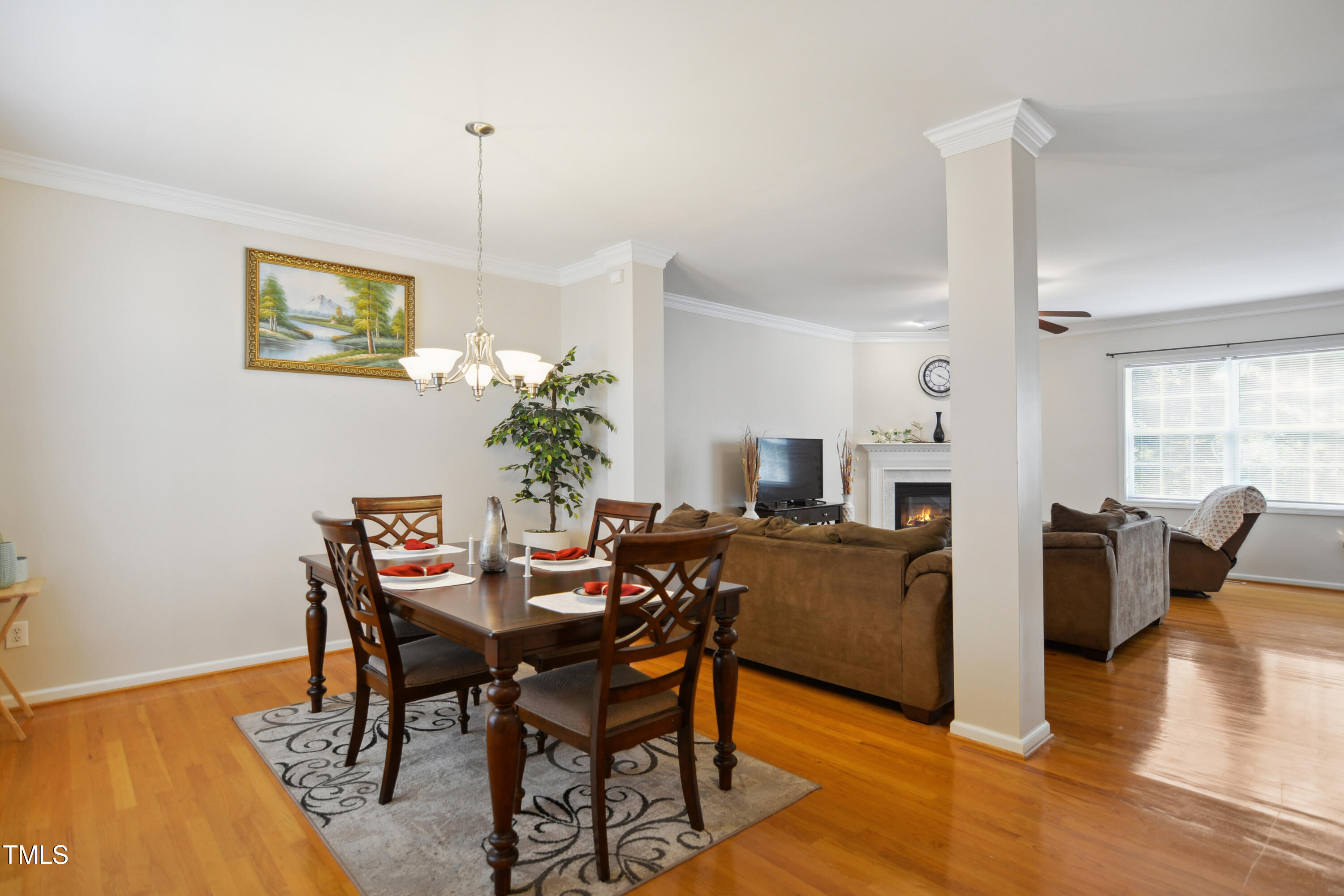101 Whitney Lane Durham, NC 27713 - Photo 5 of 28 a view of a dining room with furniture and wooden floor
