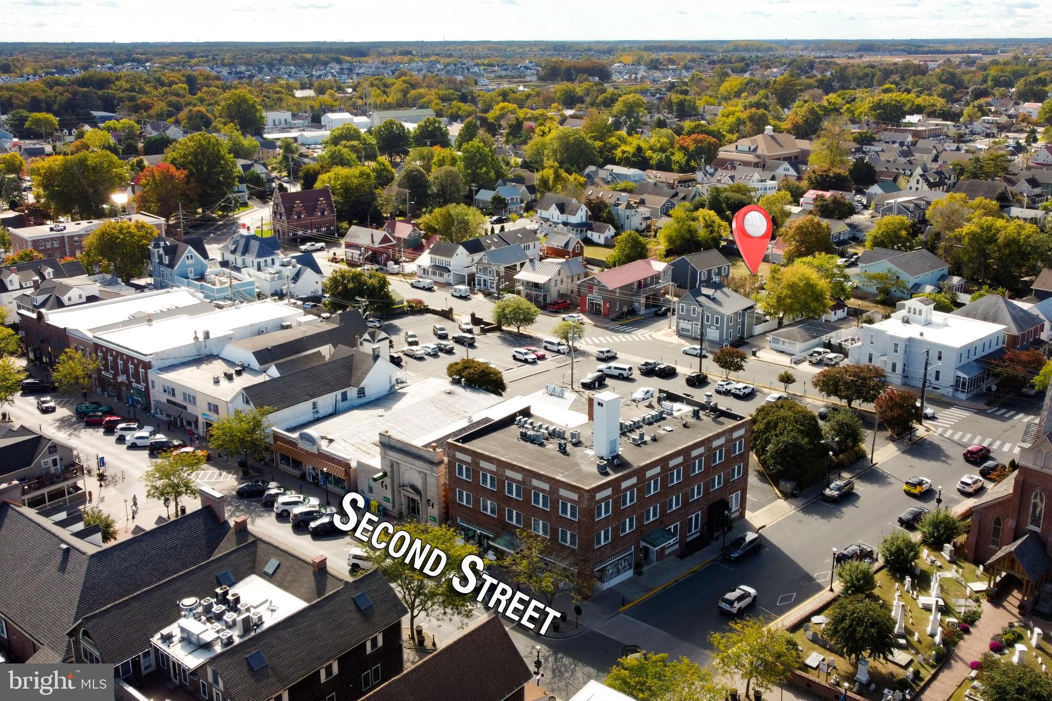 311 Chestnut Street Lewes, DE 19958 - Photo 5 of 6 an aerial view of a city with lots of residential buildings
