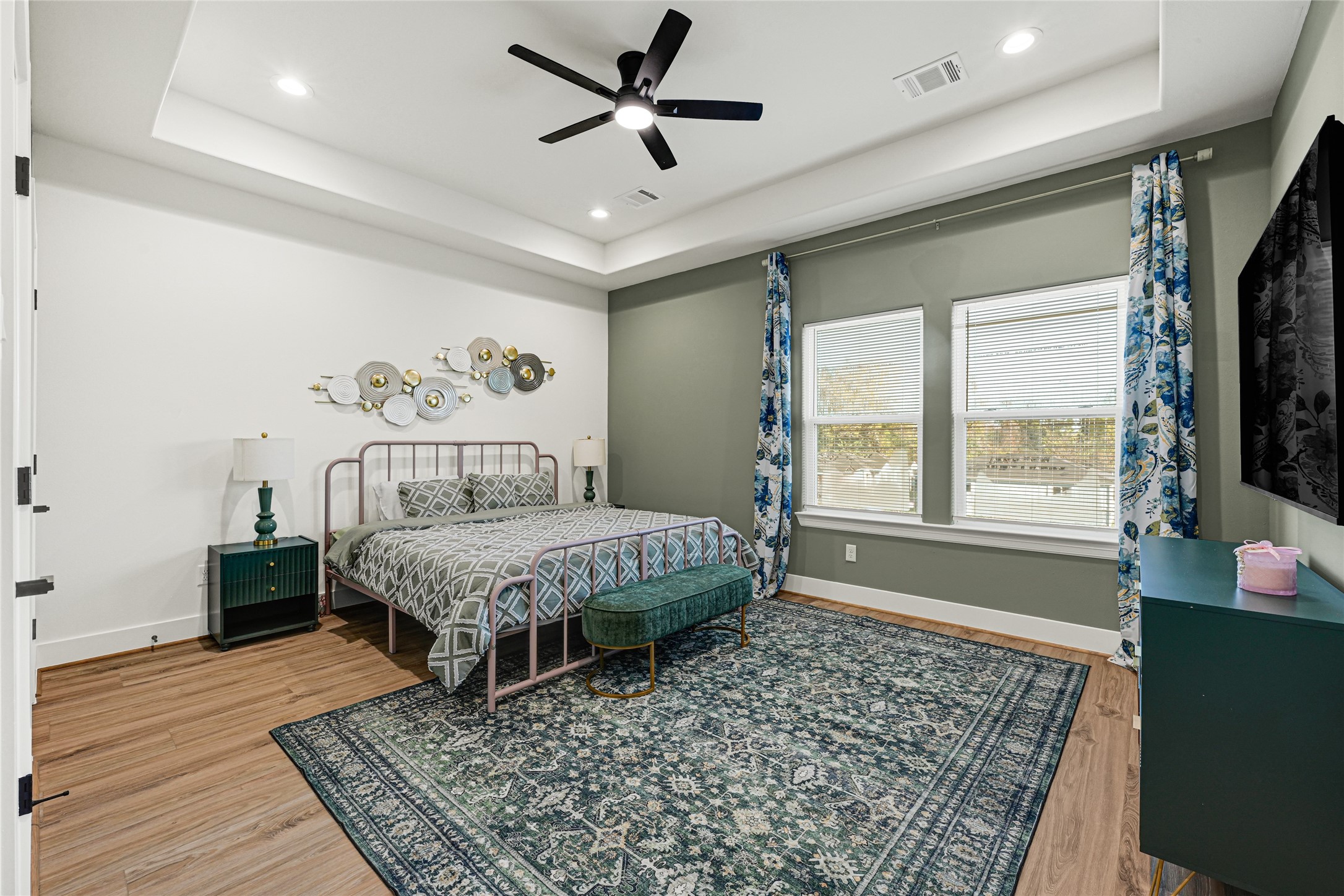3510 Rebecca Street Houston, TX 77021 - Photo 21 of 28 a bedroom with a bed rug and a large window