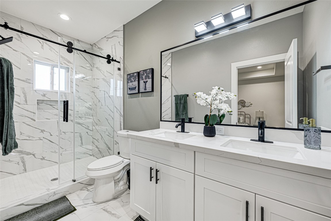 3510 Rebecca Street Houston, TX 77021 - Photo 23 of 28 a bathroom with a sink a toilet and shower
