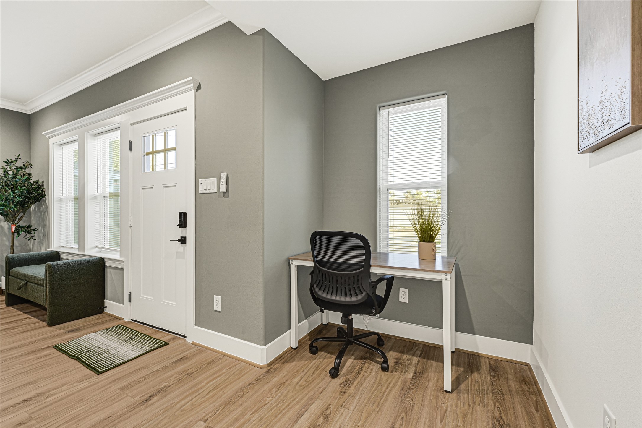 3510 Rebecca Street Houston, TX 77021 - Photo 10 of 28 a view of a workspace with furniture and a window