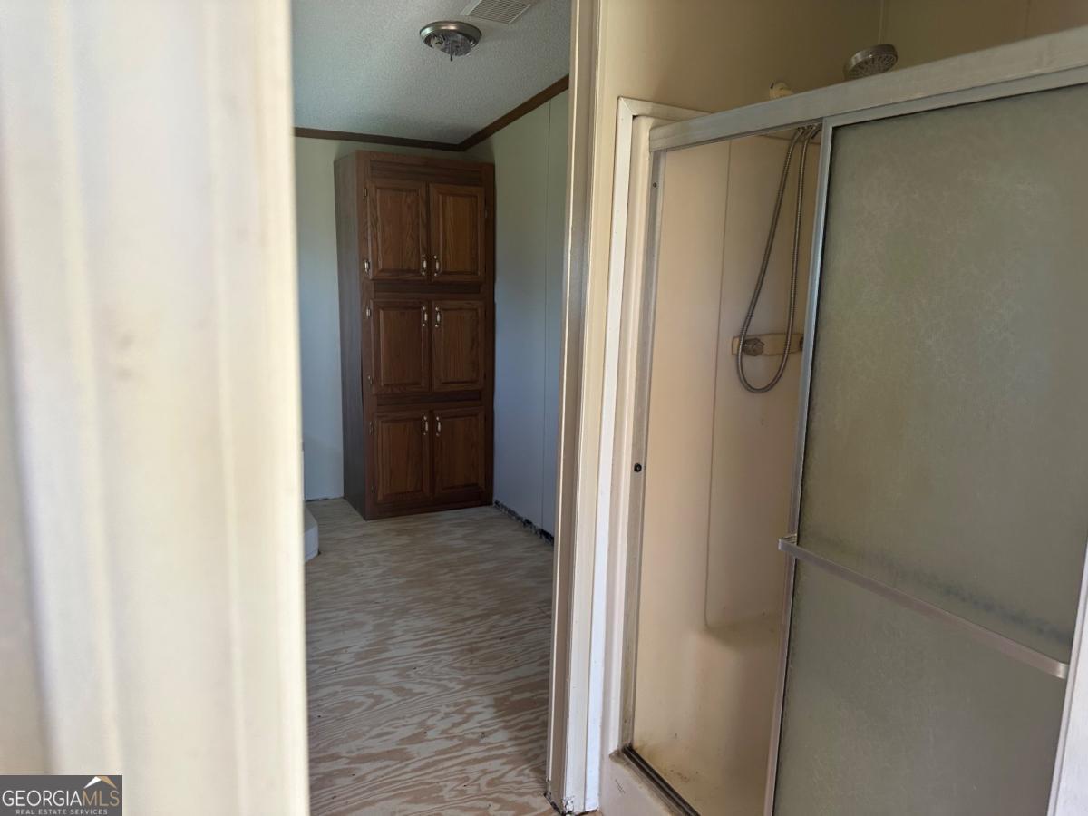 642 Still Road Alamo, GA 30411 - Photo 15 of 21 a view of closet area