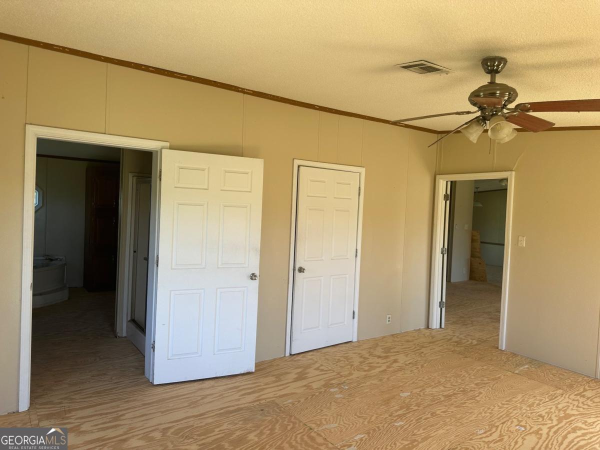 642 Still Road Alamo, GA 30411 - Photo 16 of 21 a view of a room with a hallway