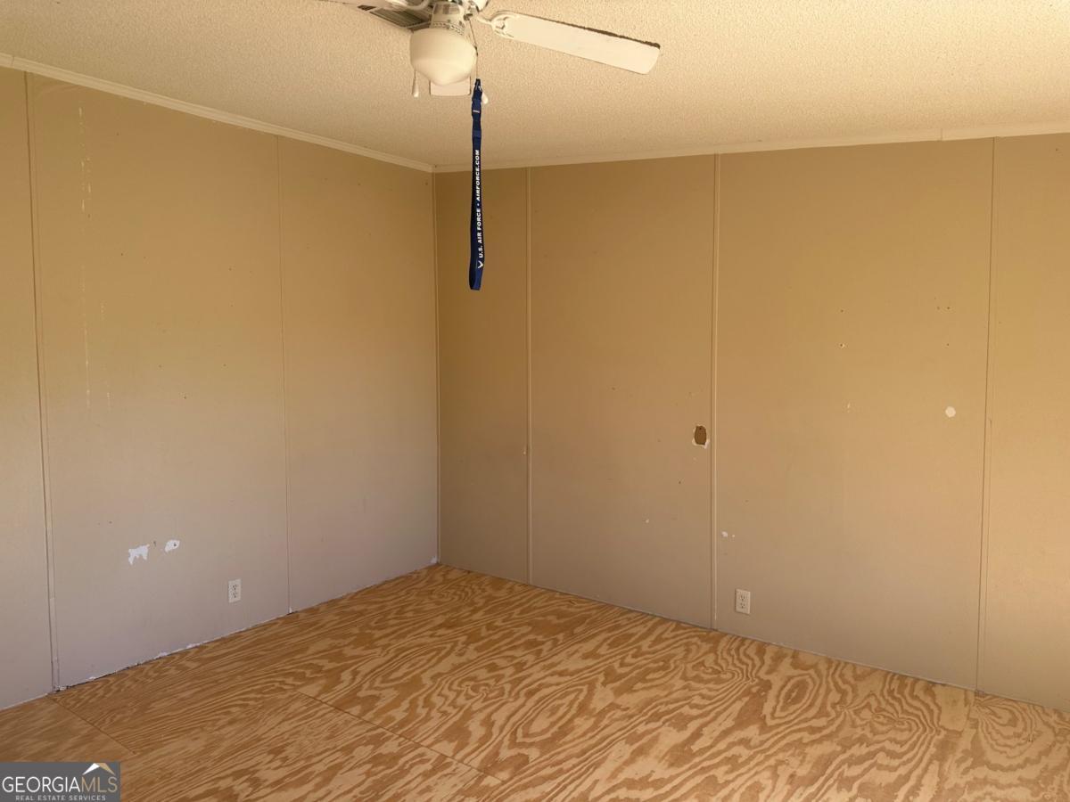 642 Still Road Alamo, GA 30411 - Photo 7 of 21 a view of a room with an empty space