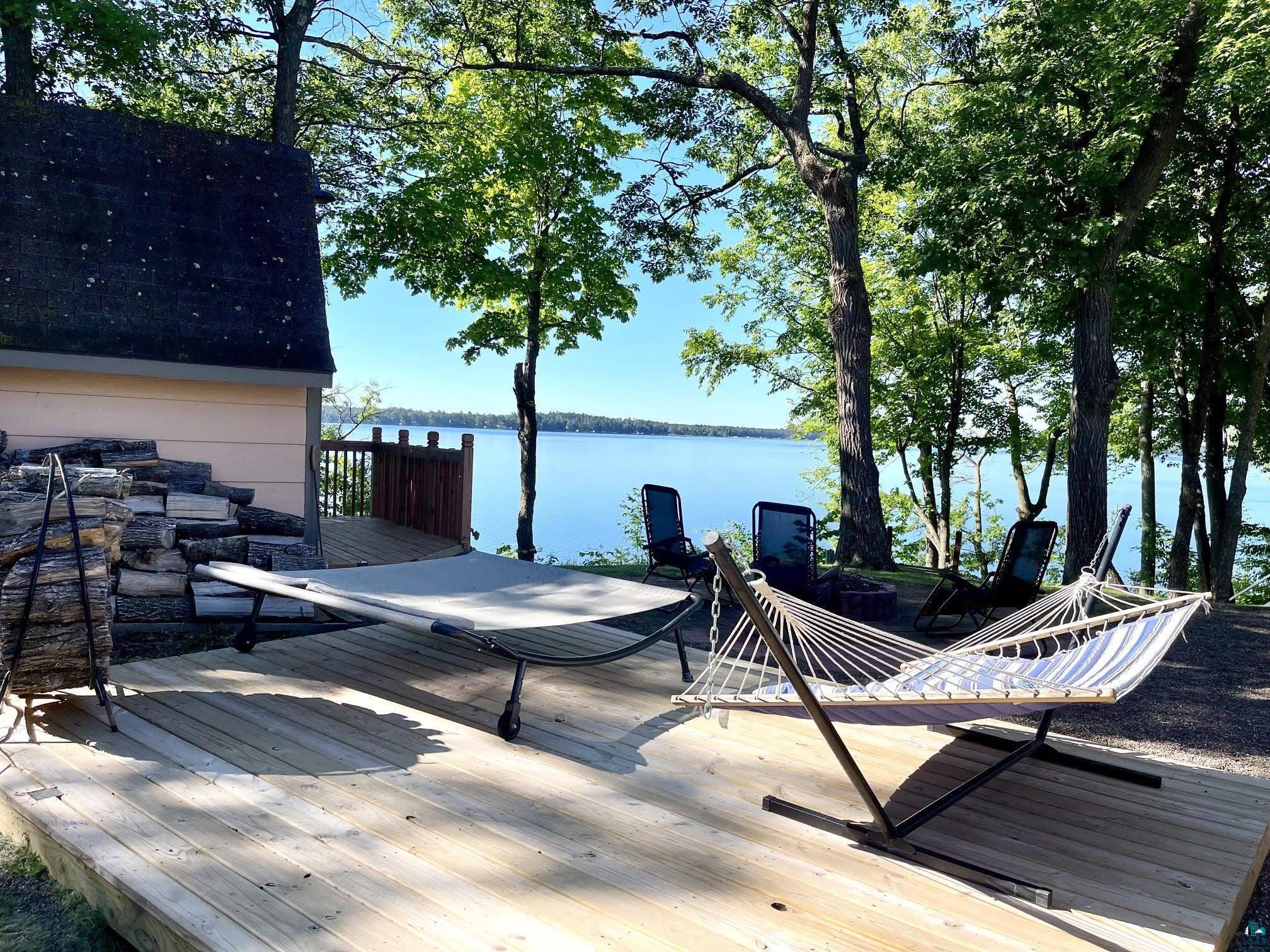 37460 Sunrise View Road Sturgeon Lake, MN 55783 - Photo 7 of 50 View of lake from 1 of the 2 decks.