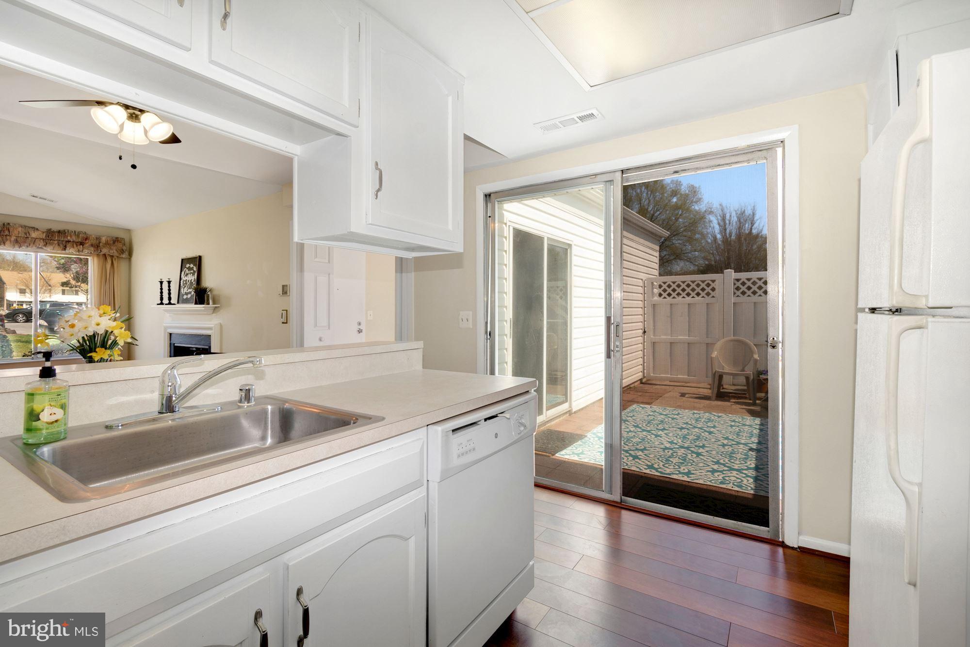 3568 Fiske Terrace, Unit 144B Silver Spring, MD 20906 - Photo 11 of 35 Kitchen Counter, view of both sliding glass doors