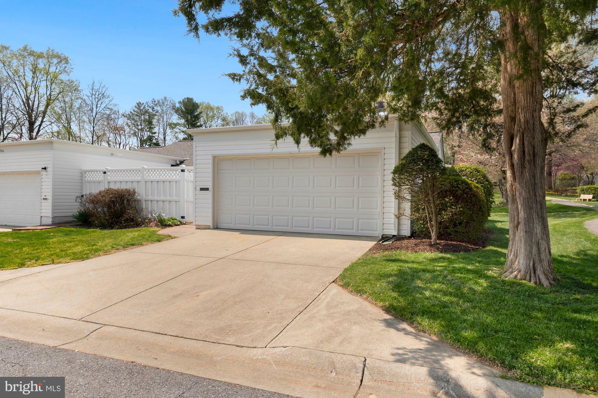 3568 Fiske Terrace, Unit 144B Silver Spring, MD 20906 - Photo 15 of 35 Garage and Patio entrance to home