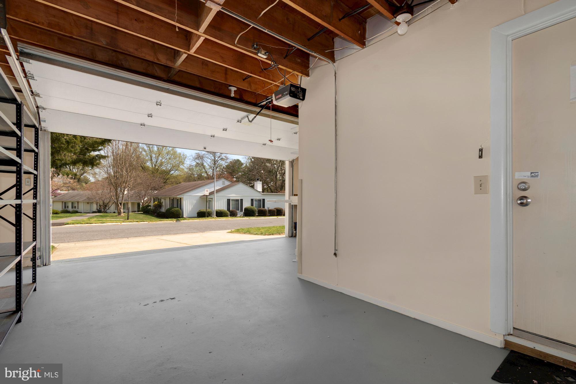 3568 Fiske Terrace, Unit 144B Silver Spring, MD 20906 - Photo 26 of 35 Garage, was 2 car, now 1 car with storage area