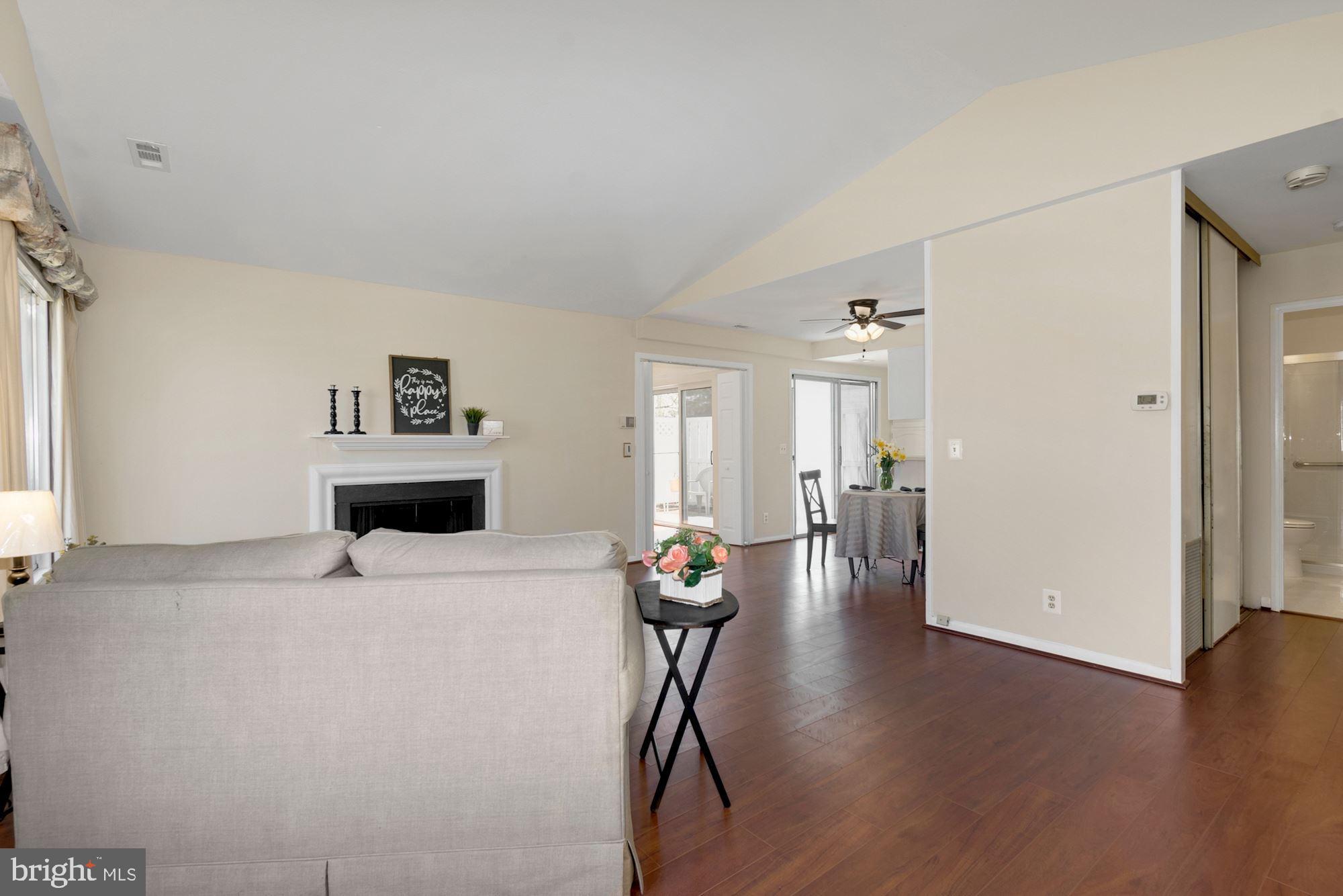 3568 Fiske Terrace, Unit 144B Silver Spring, MD 20906 - Photo 6 of 35 From entry way, living room & fireplace