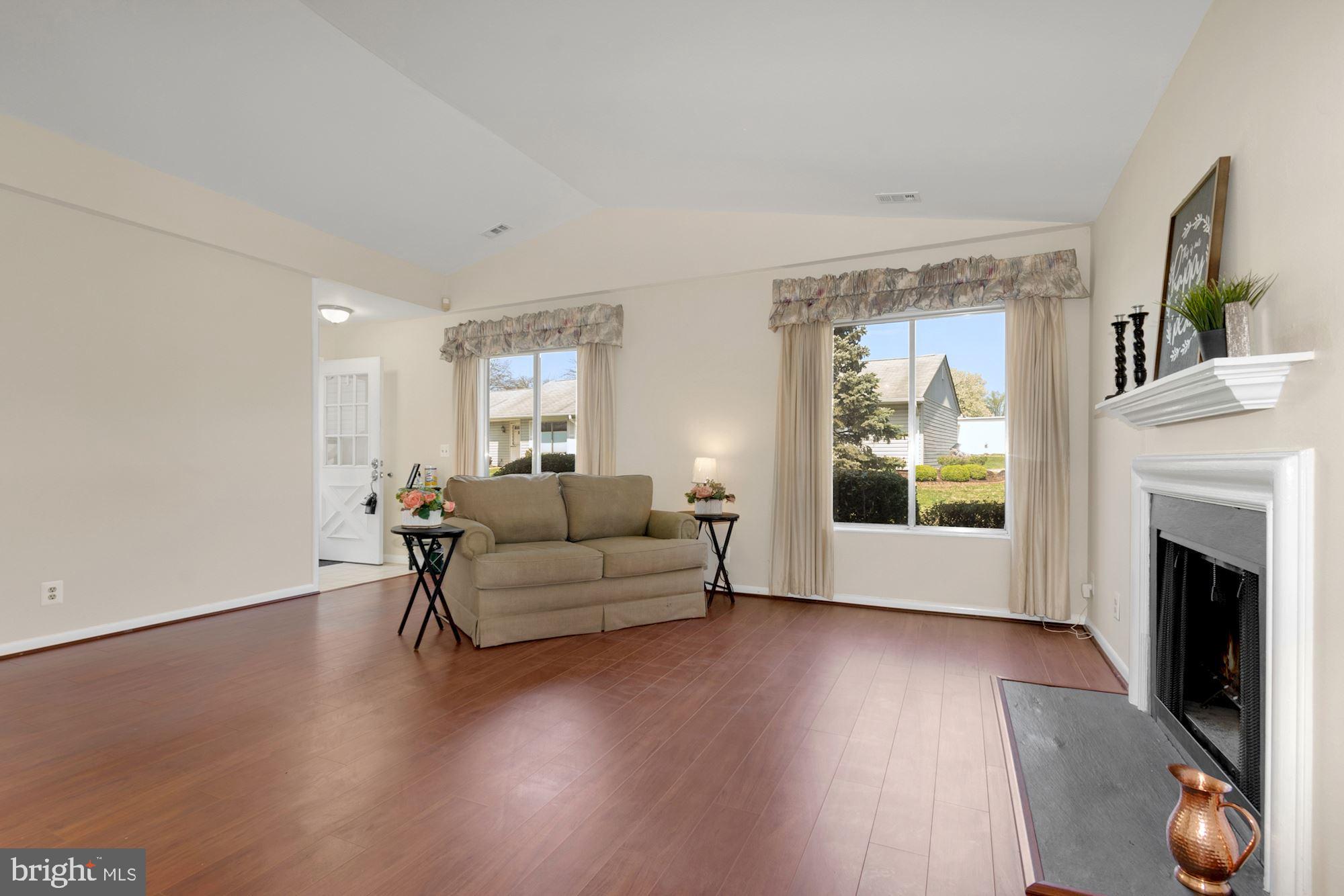 3568 Fiske Terrace, Unit 144B Silver Spring, MD 20906 - Photo 7 of 35 Living room area and 2 windows out, FP