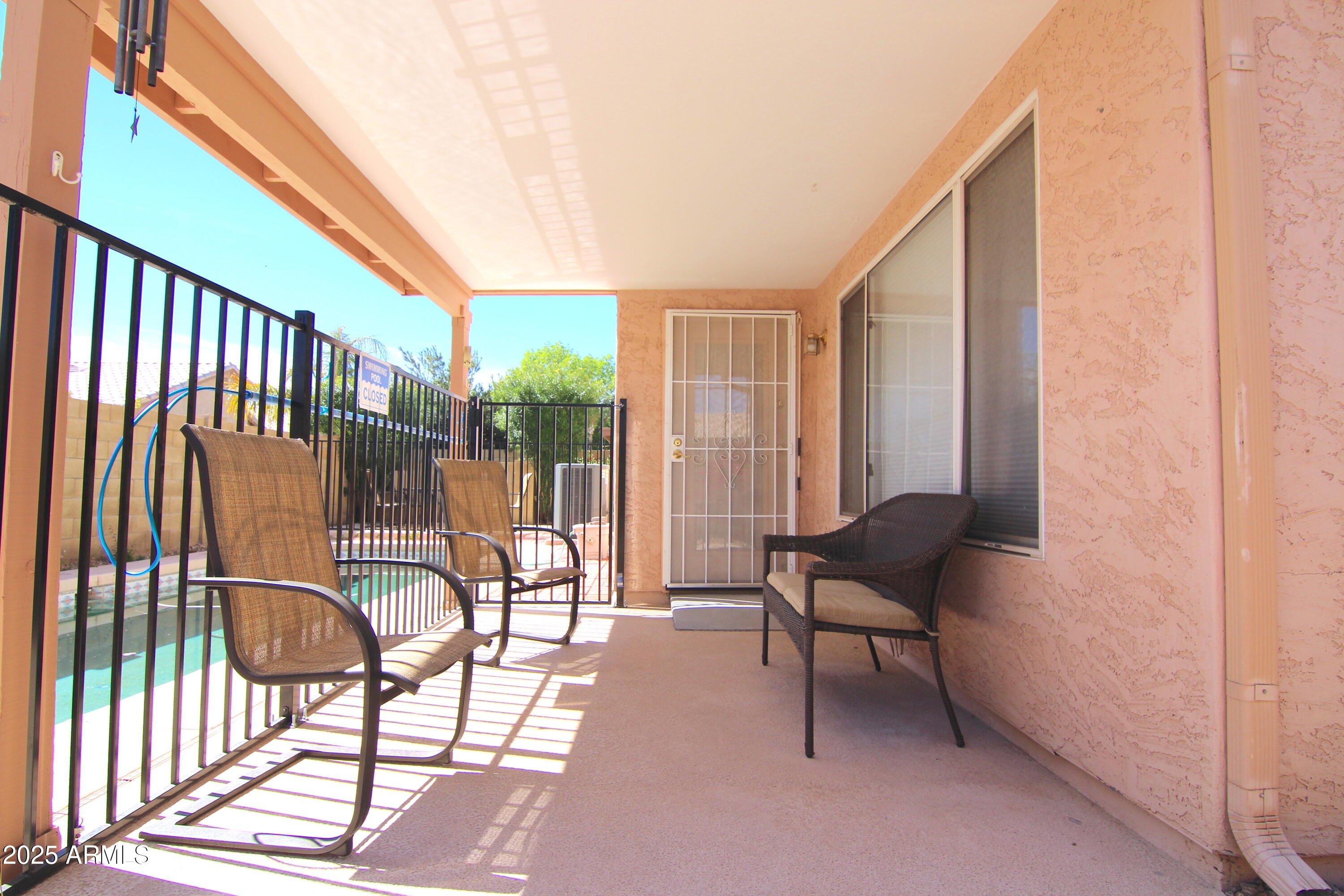 3569 East Utopia Road Phoenix, AZ 85050 - Photo 15 of 16 a view of a chairs and table in the balcony