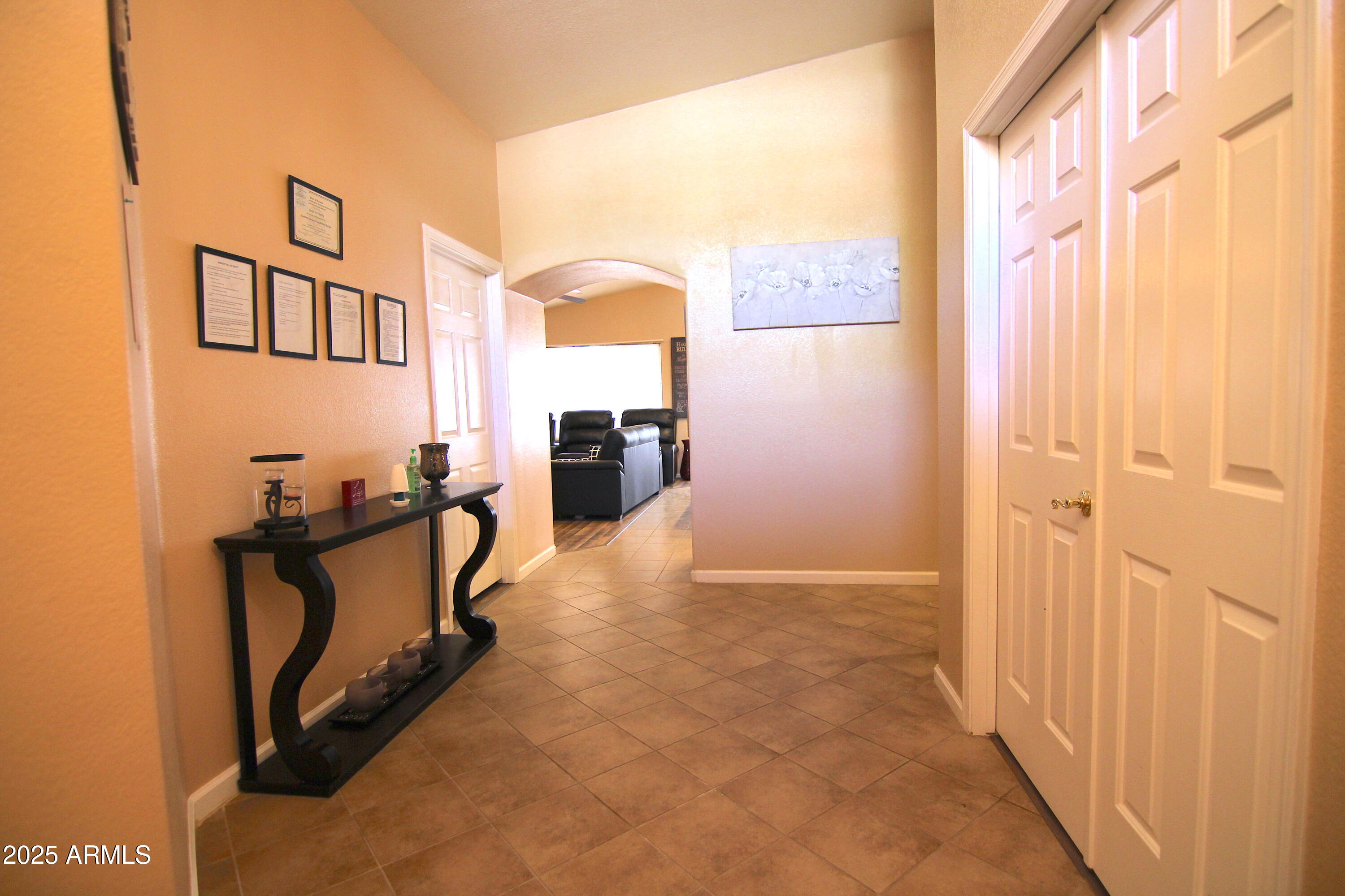 3569 East Utopia Road Phoenix, AZ 85050 - Photo 10 of 16 a view of an entryway with furniture