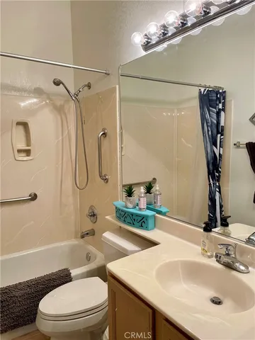 a patio with a patio table and chairs