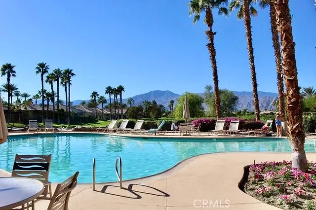 a view of a golf course with a lake