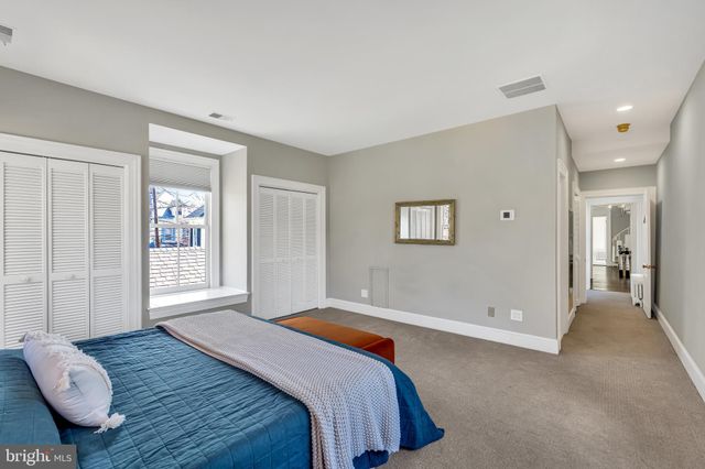a view of a bathroom from a hallway