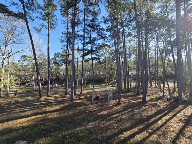 a view of a park with swings and slides