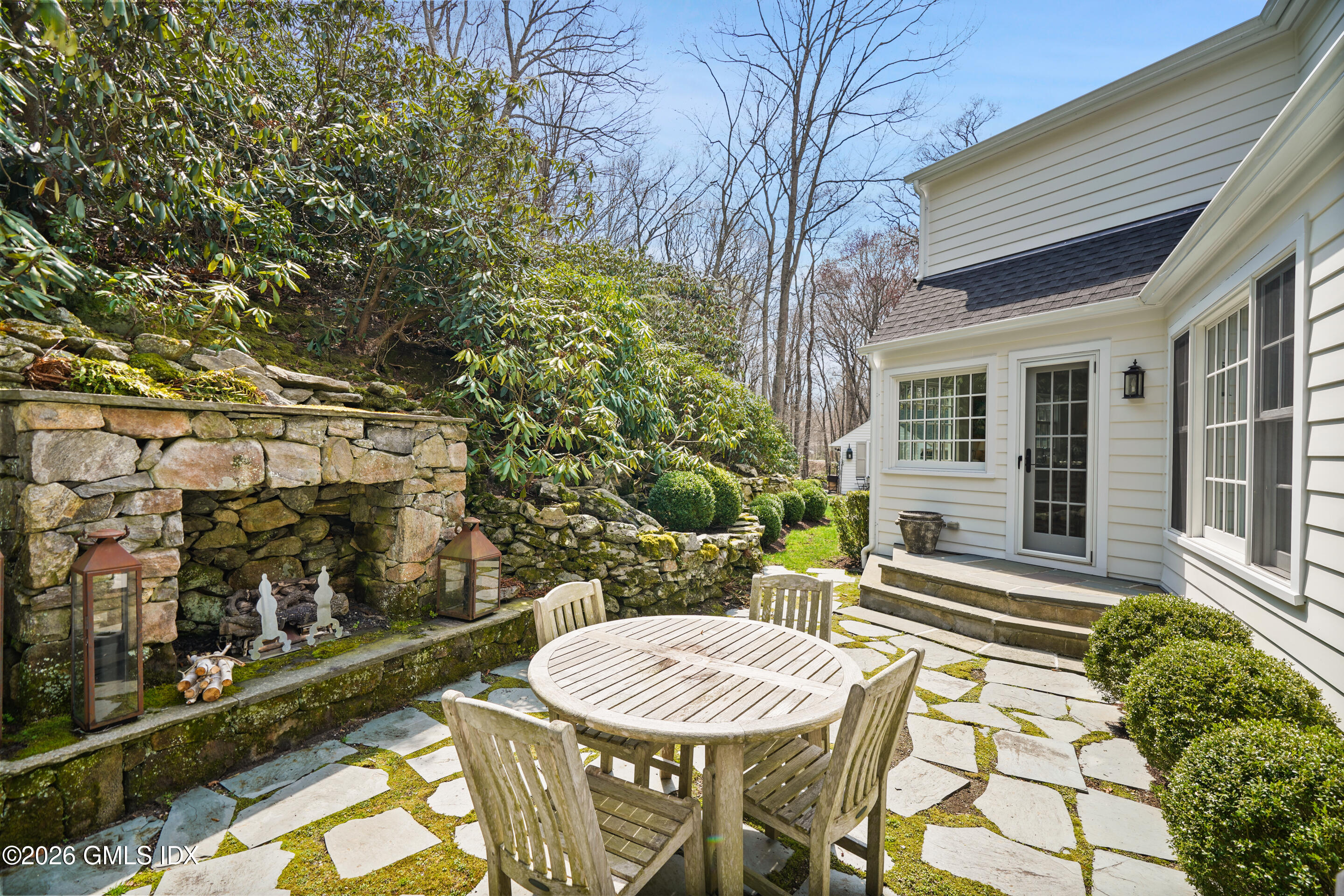 1102 Rock Rimmon Road Stamford, CT 06903 - Photo 8 of 28 backyard terracw w fireplace
