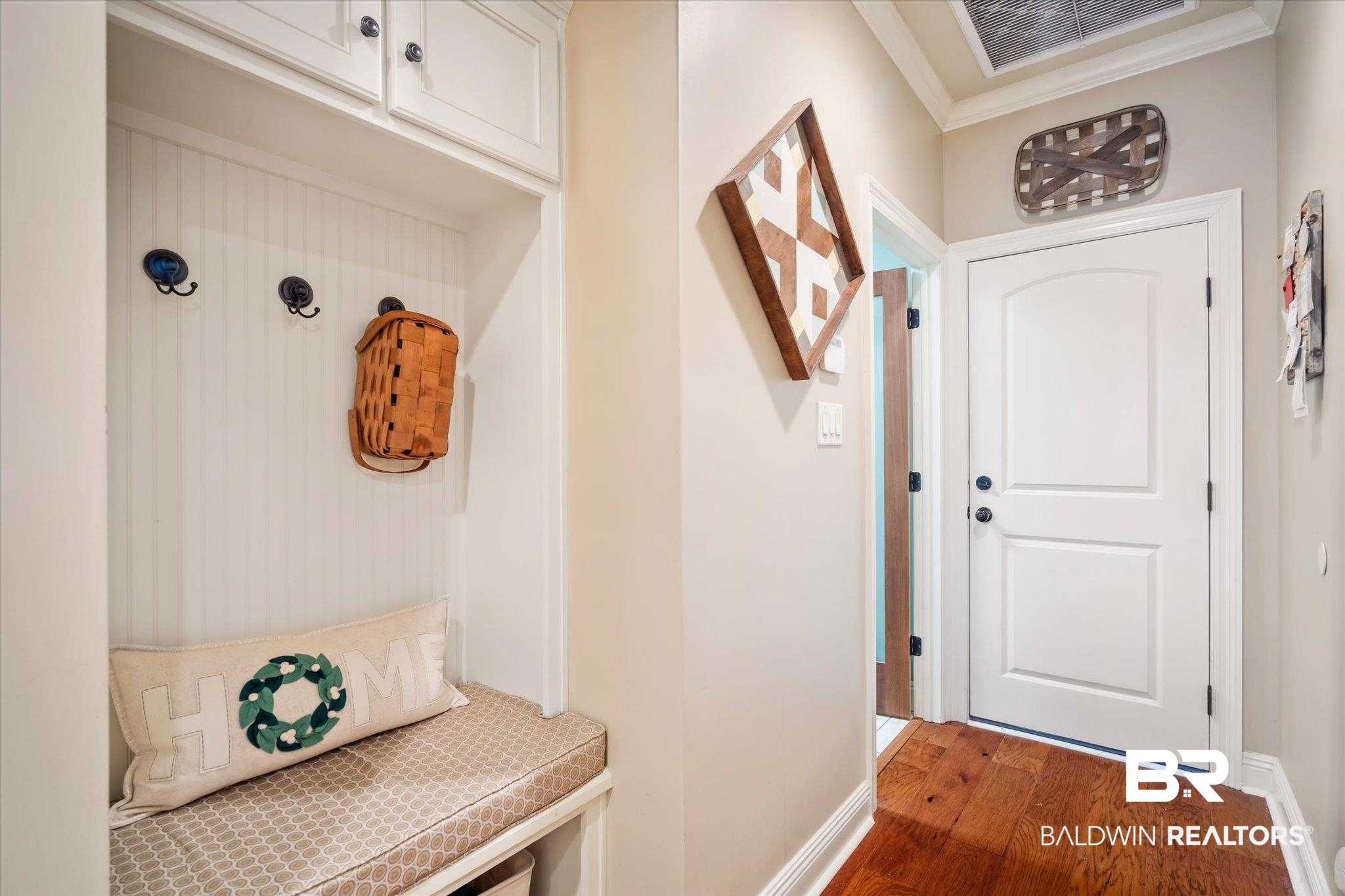 5683 Spring Landing Drive Theodore, AL 36582 - Photo 24 of 49 Mudroom with crown molding and hardwood / wood-style floors