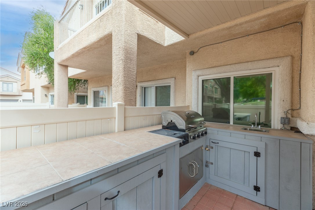 6031 Fiddler Ridge Trail, Unit 103 Henderson, NV 89011 - Photo 3 of 28 Only unit in the community with an outdoor kitchen.