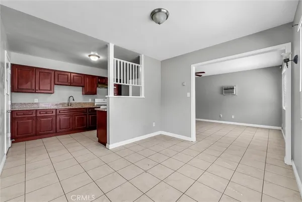 a kitchen with stainless steel appliances cabinets a sink and a stove
