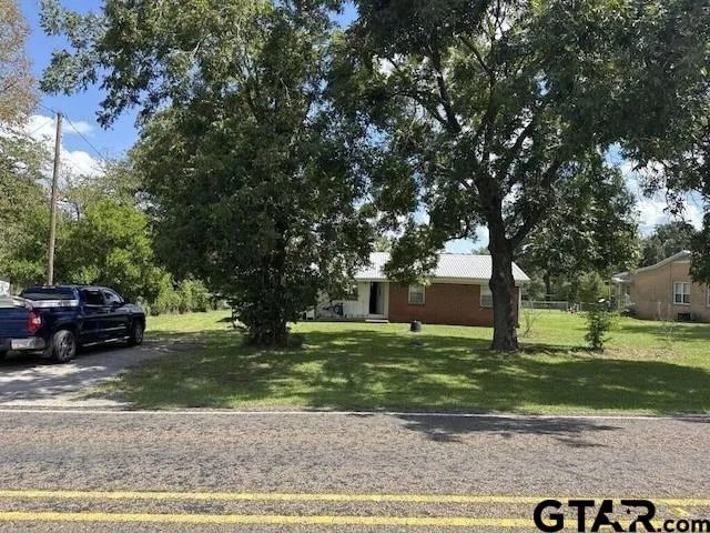 a view of a backyard with a garden