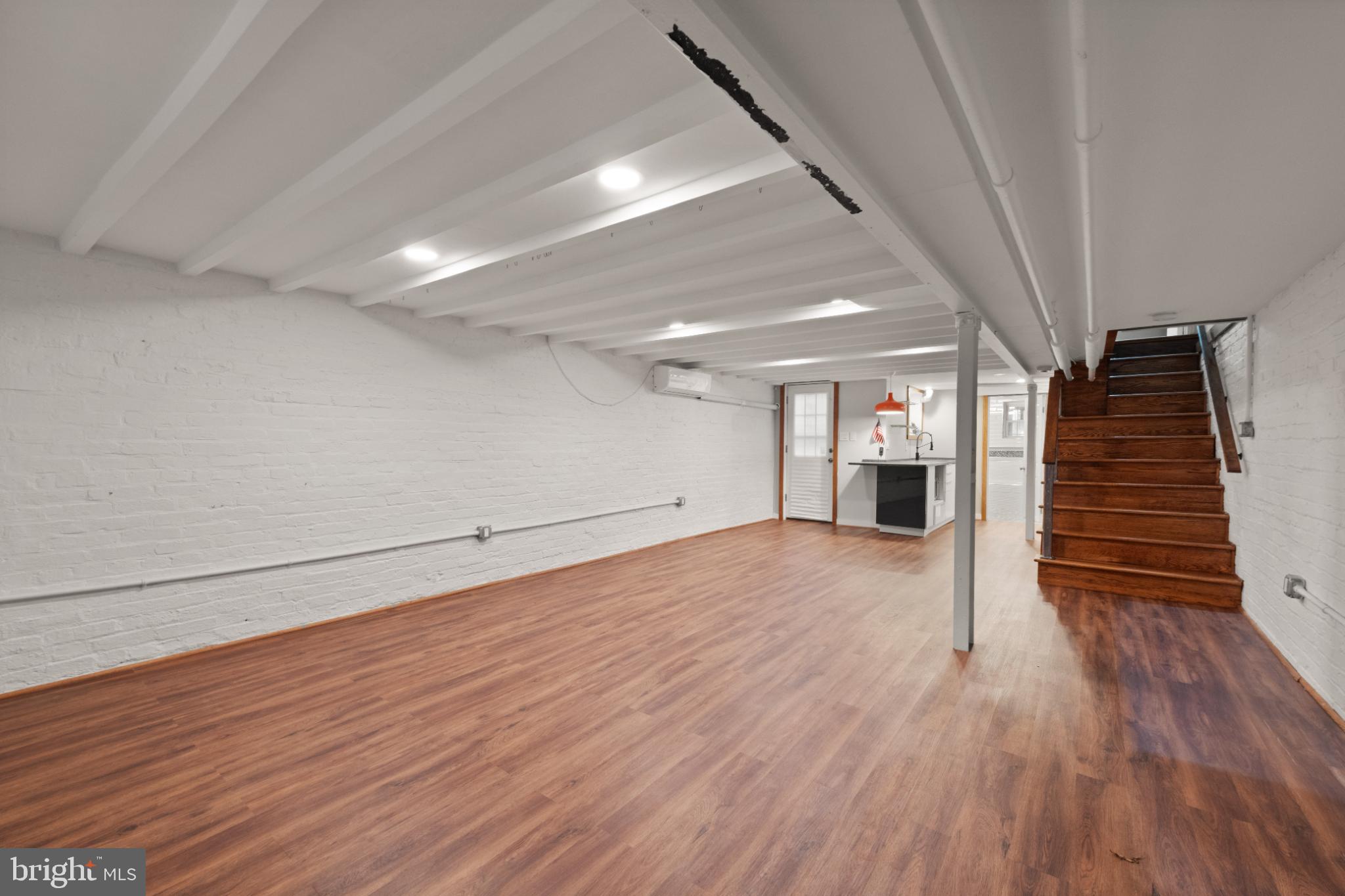 445 Newton Place Northwest Washington, DC 20010 - Photo 19 of 26 a view of empty room with wooden floor