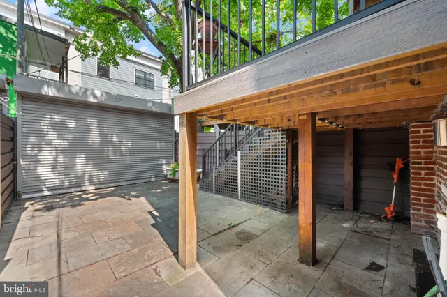 a view of a chairs setting on the roof deck
