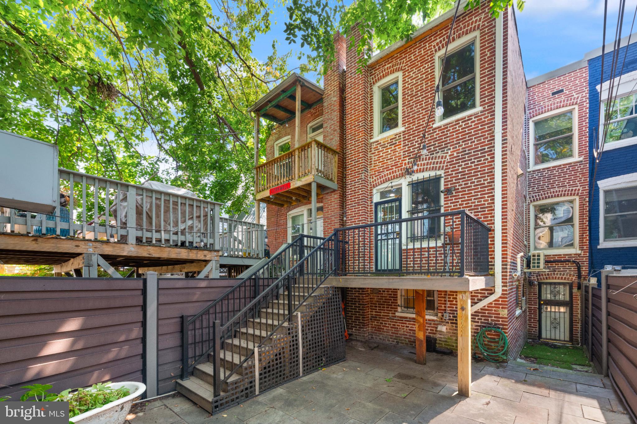 445 Newton Place Northwest Washington, DC 20010 - Photo 25 of 26 a view of a chairs setting on the roof deck