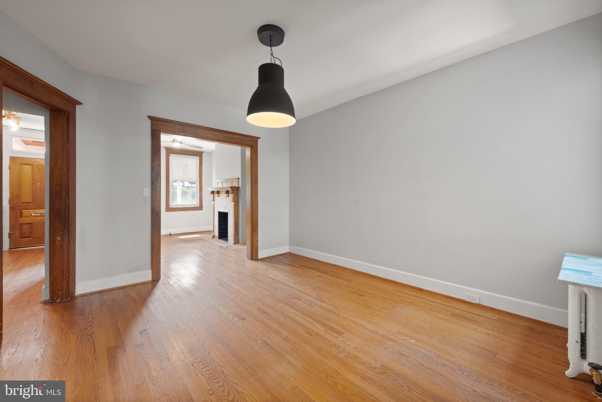 445 Newton Place Northwest Washington, DC 20010 - Photo 8 of 26 a view of empty room with wooden floor and fan