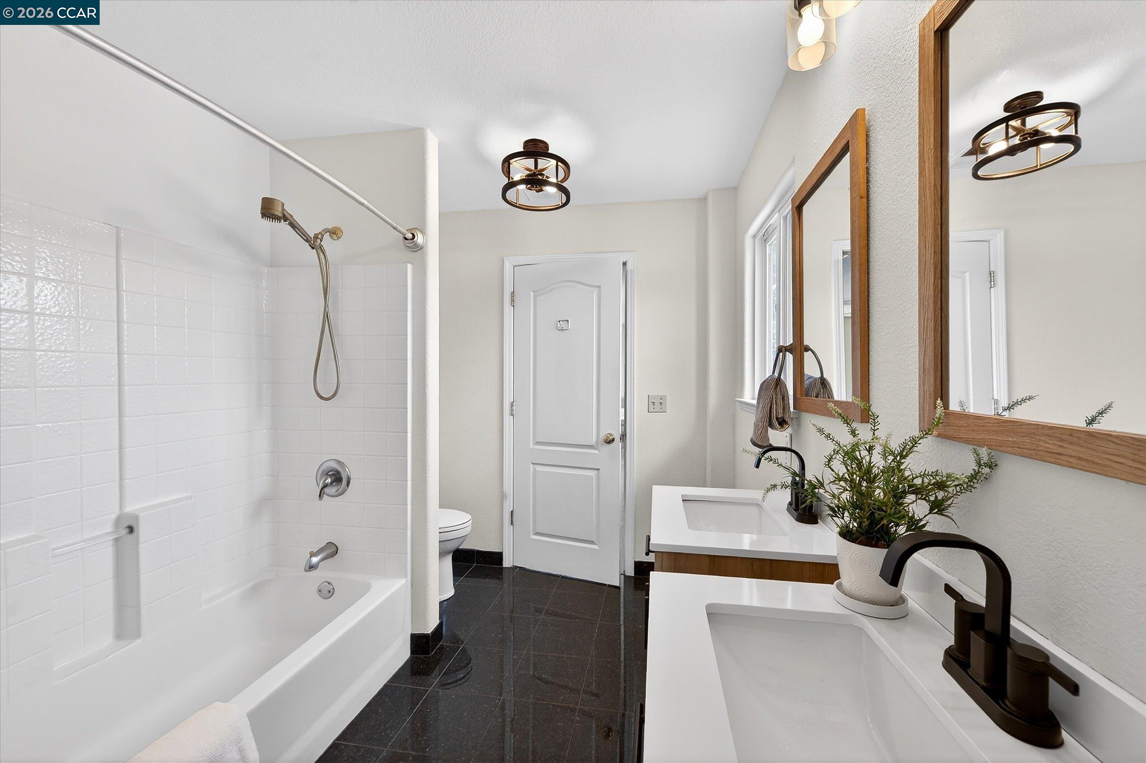 2659 3rd Street Livermore, CA 94550 - Photo 13 of 40 a white bath tub sitting next to a shower