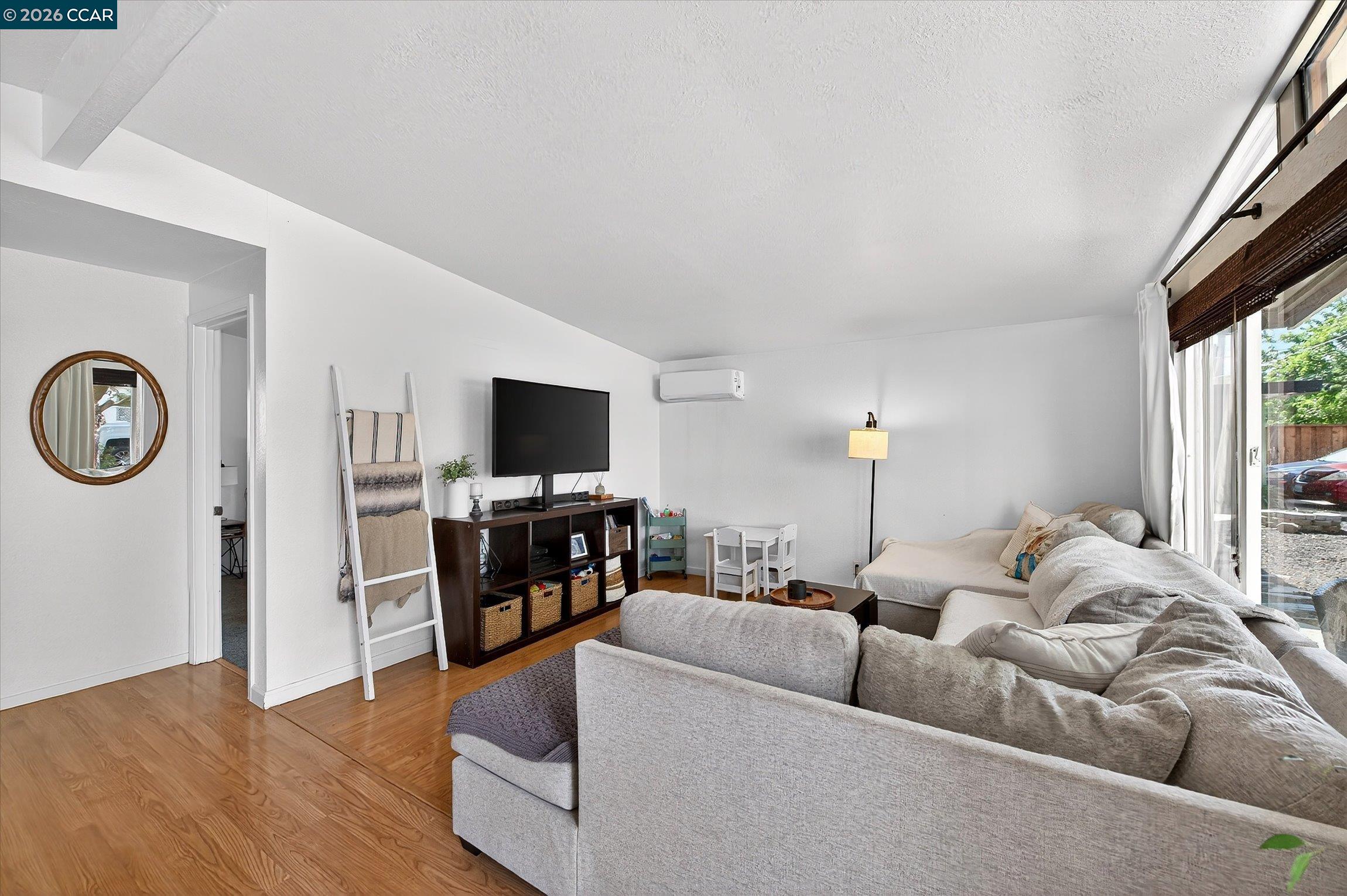 2659 3rd Street Livermore, CA 94550 - Photo 2 of 40 a living room with furniture and a flat screen tv