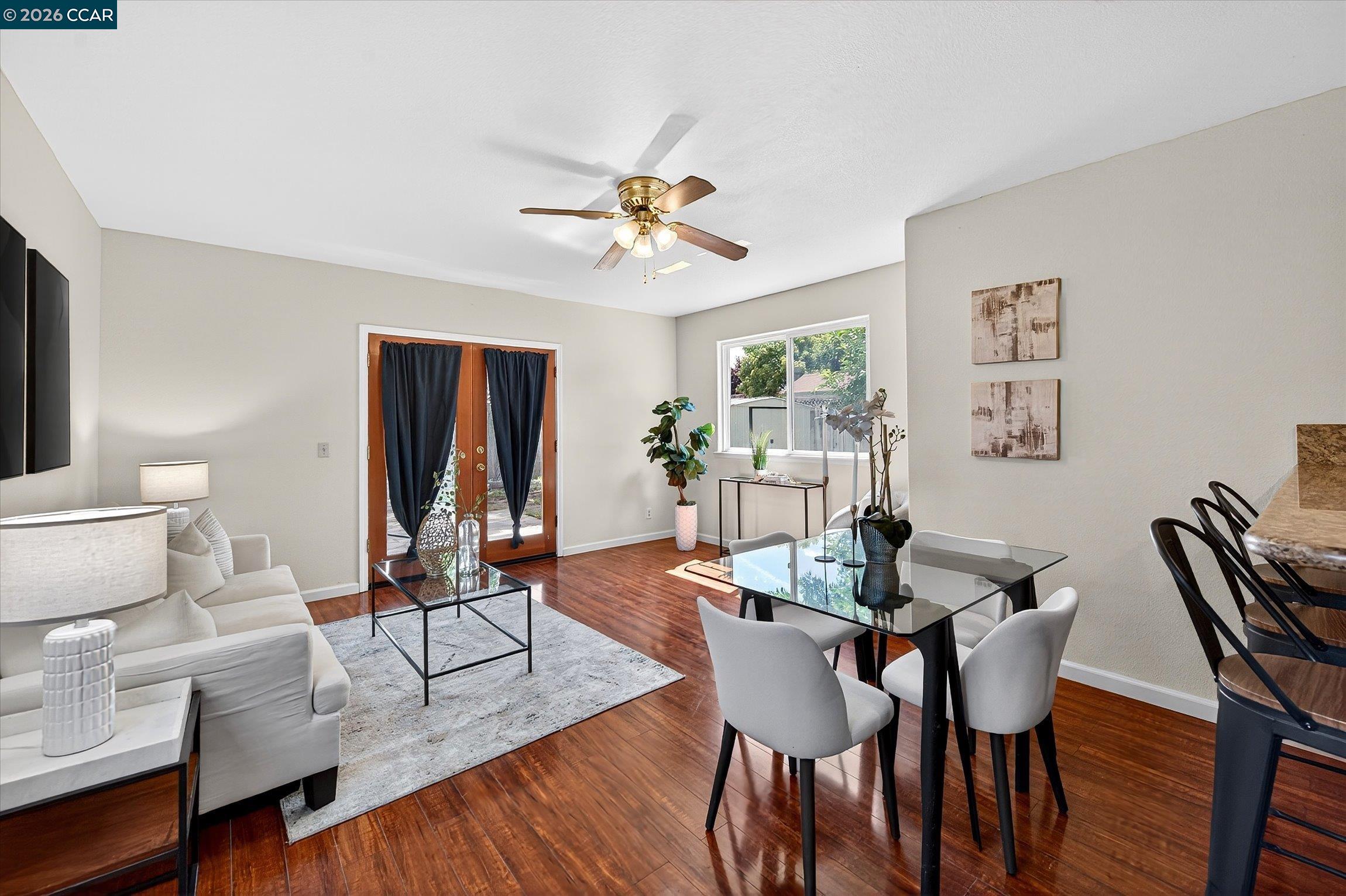 2659 3rd Street Livermore, CA 94550 - Photo 22 of 40 a view of a dining room with furniture window and wooden floor