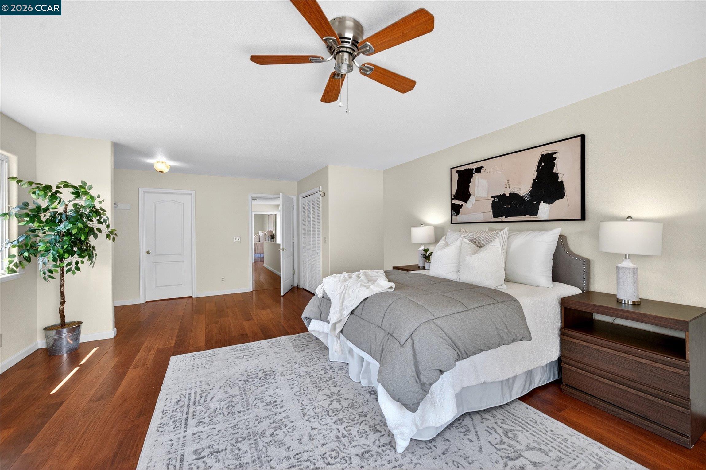 2659 3rd Street Livermore, CA 94550 - Photo 37 of 40 a bedroom with a bed and a potted plant