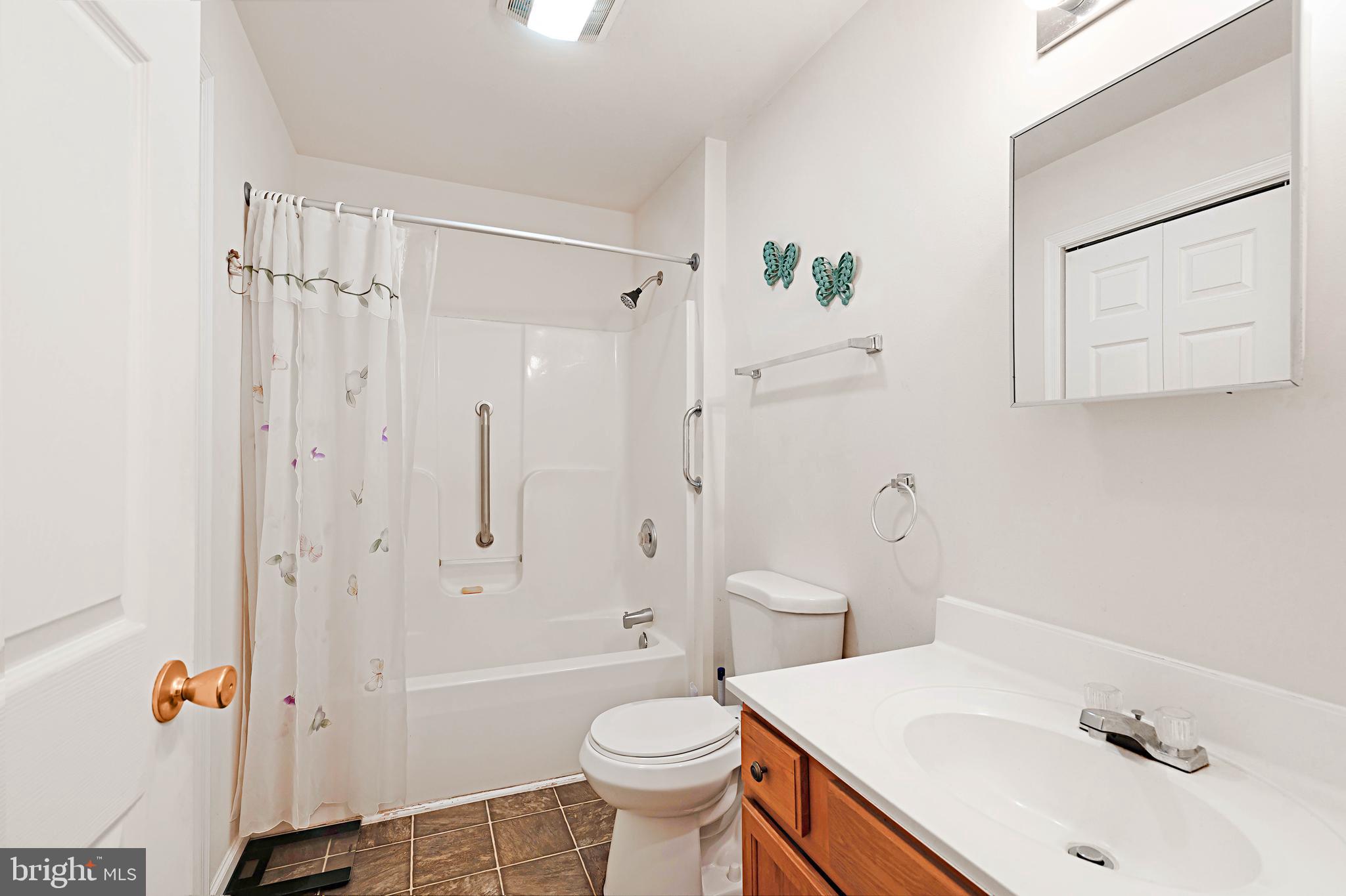 315 Beech Road Millville, NJ 08332 - Photo 13 of 21 a bathroom with a sink toilet and shower