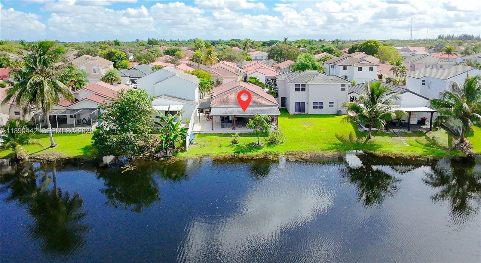 4810 Southwest 153rd Terrace Miramar, FL 33027 - Photo 29 of 41 an aerial view of a house with swimming pool patio and outdoor seating