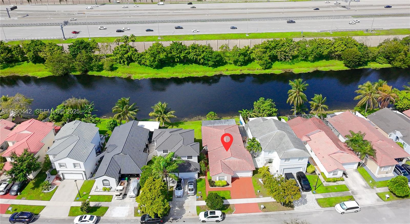 4810 Southwest 153rd Terrace Miramar, FL 33027 - Photo 34 of 41 an aerial view of a house with outdoor space and lake view
