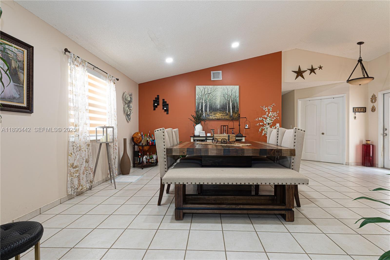 4810 Southwest 153rd Terrace Miramar, FL 33027 - Photo 8 of 41 a living room with furniture and a flat screen tv