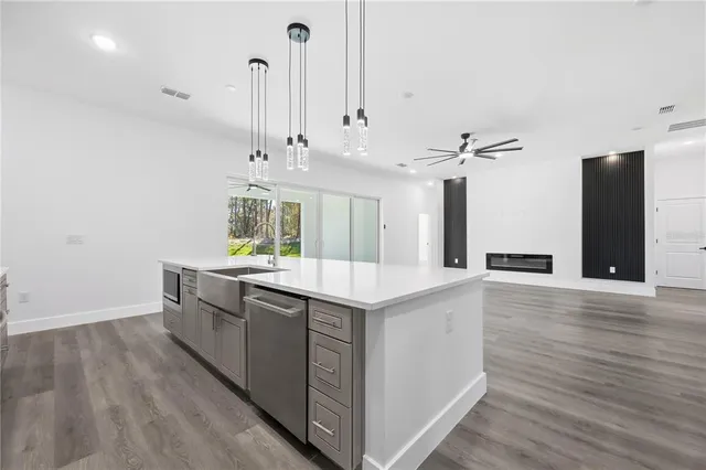 a spacious bathroom with a bathtub and shower