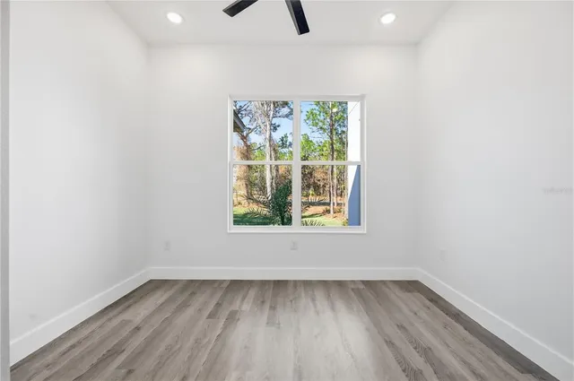 a bathroom with a sink a vanity and a mirror