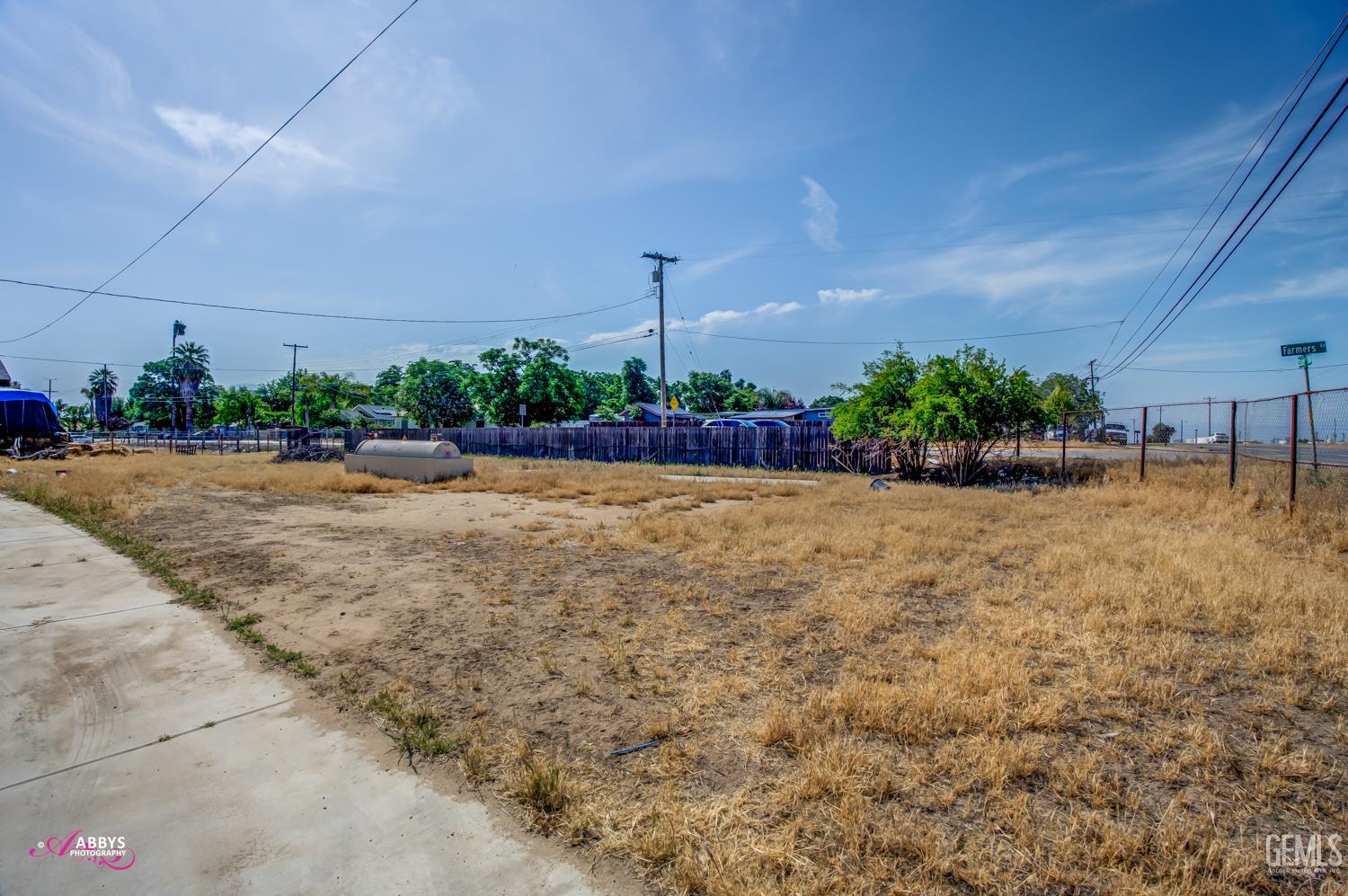 Undisclosed Address Bakersfield, CA 93307 - Photo 4 of 62 a view of a garden with potted plants