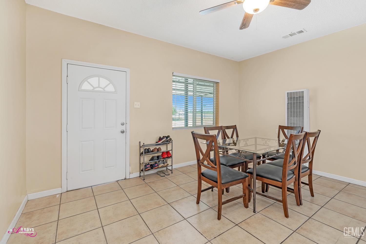 Undisclosed Address Bakersfield, CA 93307 - Photo 44 of 62 a dining room with furniture and window