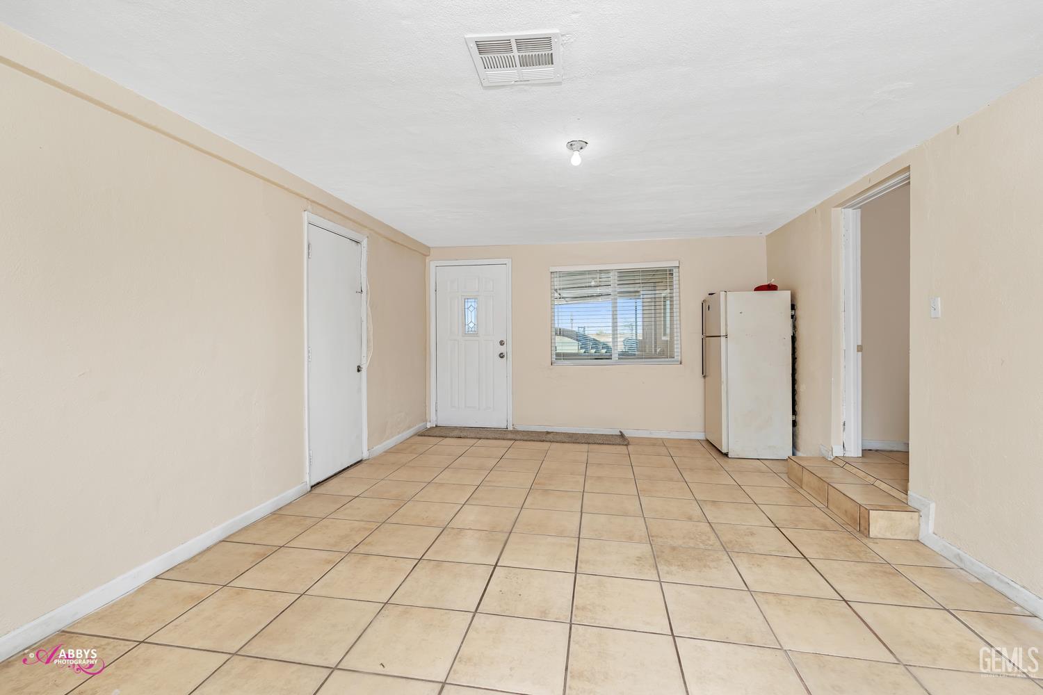 Undisclosed Address Bakersfield, CA 93307 - Photo 61 of 62 a view of an empty room and window