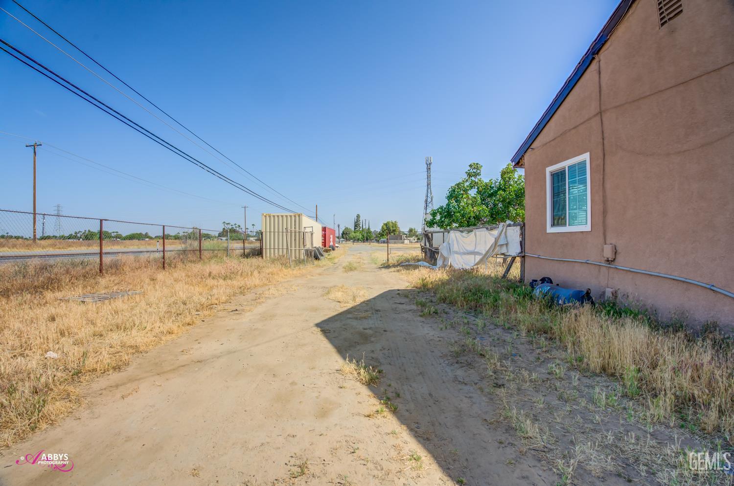 Undisclosed Address Bakersfield, CA 93307 - Photo 7 of 62 a view of a backyard