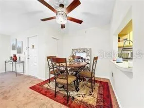 a kitchen with stainless steel appliances granite countertop a refrigerator stove microwave and sink