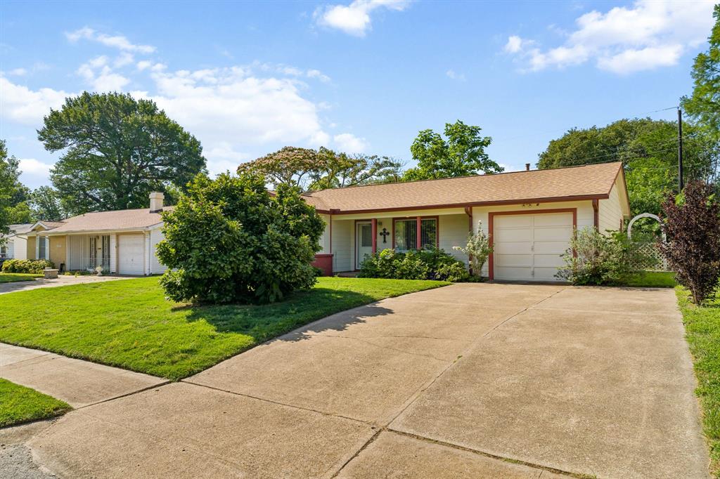 1822 Finley Road Irving, TX 75062 - Photo 37 of 38 a view of a house with a yard