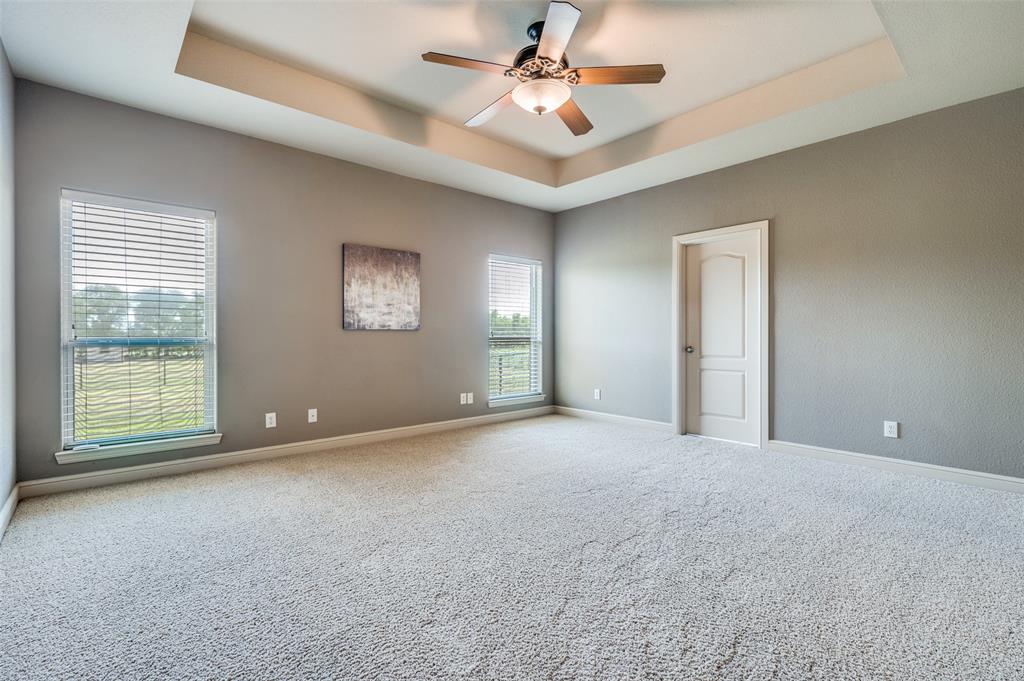 9213 Chisum Road DISH, TX 76247 - Photo 12 of 31 a view of an empty room with a window