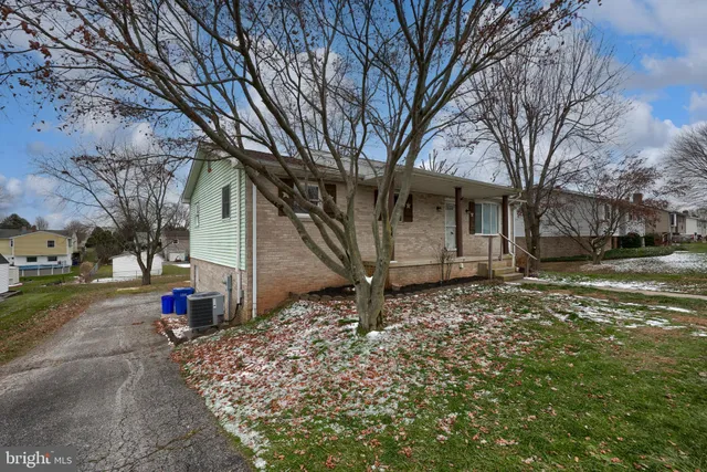 a fire hydrant in the middle of a field