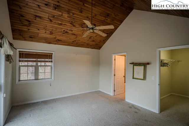 a view of a room with windows